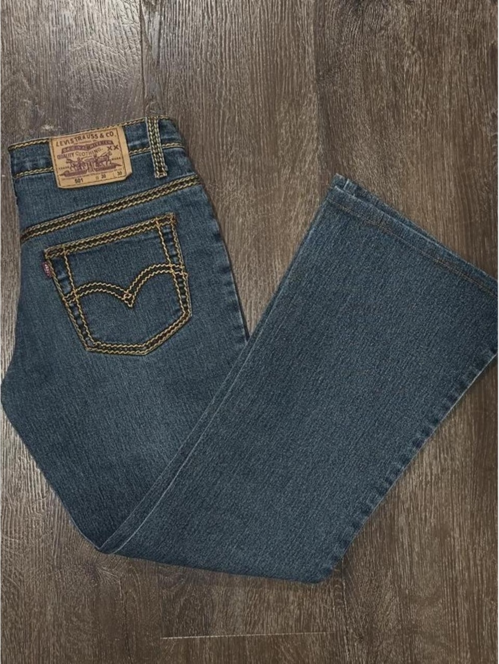 Levi's 501 low rise & flare blue jeans with gold stitching